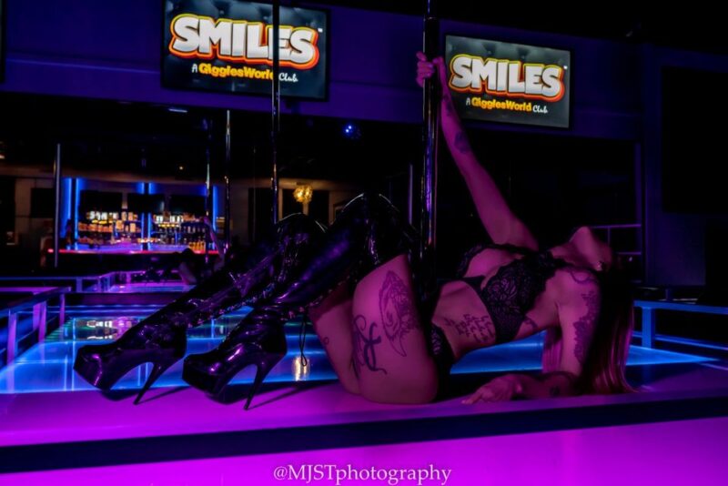 Smiles Girl Laying on Stage